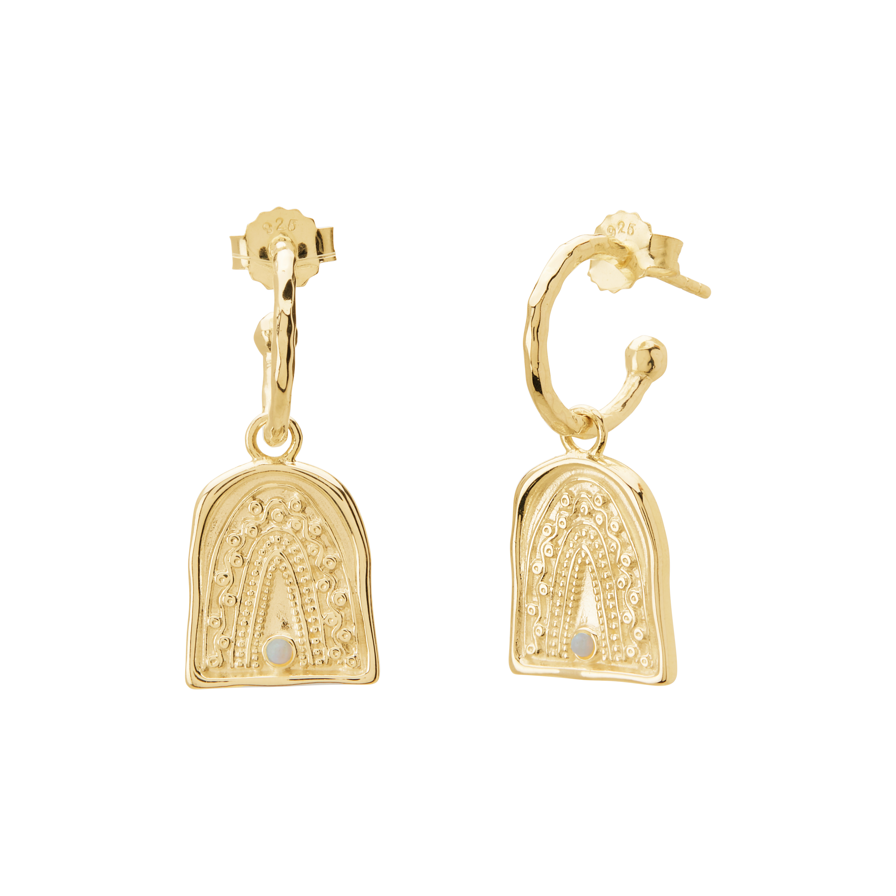 Gold earrings with intricate designs on a white background